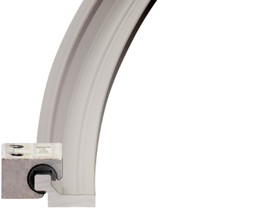 Carcasa lineal para raíles curvados